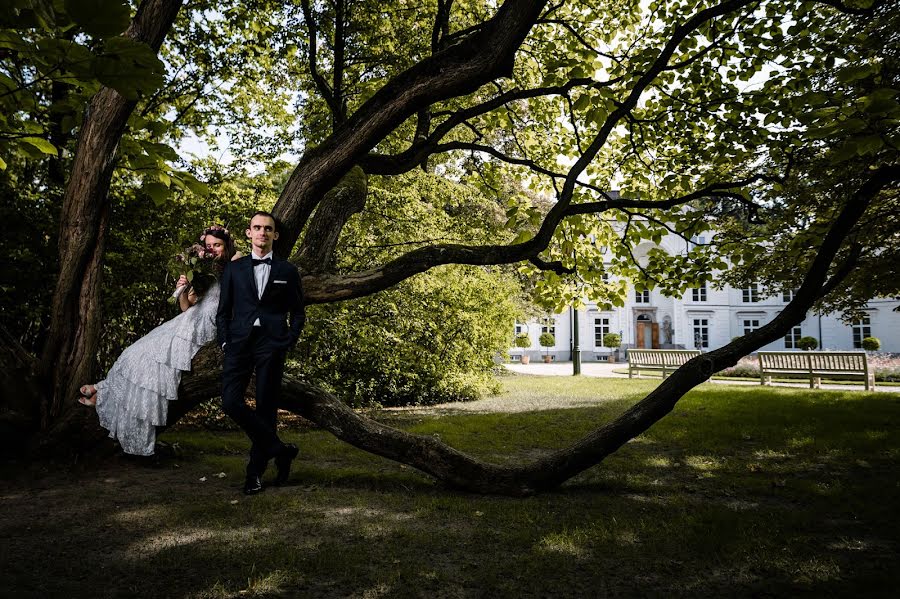 Svadobný fotograf Łukasz Kuczyński (kuczynski). Fotografia publikovaná 24. februára 2020