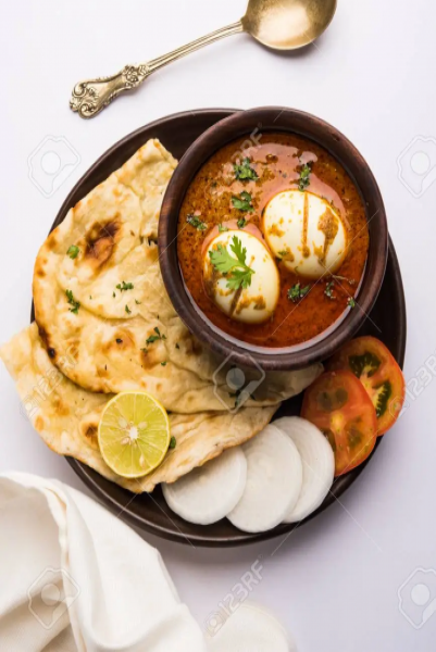 Egg Curry [300 Ml] + 2 Butter Tandoori Roti [ttc]