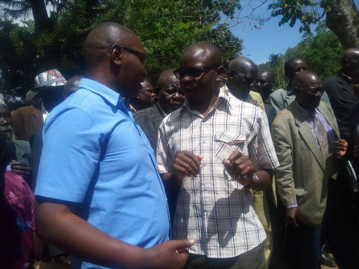 Bungoma deputy governor Hillary Chongowony and communication director mark Kapchanga after meeting council of elders in Webuye./JOHN NALIANYA