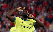 Inter Milan's Romelu Lukaku celebrates scoring their second goal in the Uefa Champions League quarterfinal first match against Benfica at Estadio da Luz in Lisbon on April 11 2023.