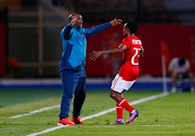 Al Ahly's Percy Tau celebrates scoring their first goal with coach Pitso Mosimane.