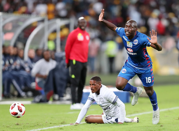 Graig Martin of Cape Town City is fouled by Aubrey Modiba of SuperSport United during the MTN8 final match at the Moses Mabhida Stadium, Durban on September 29, 2018.