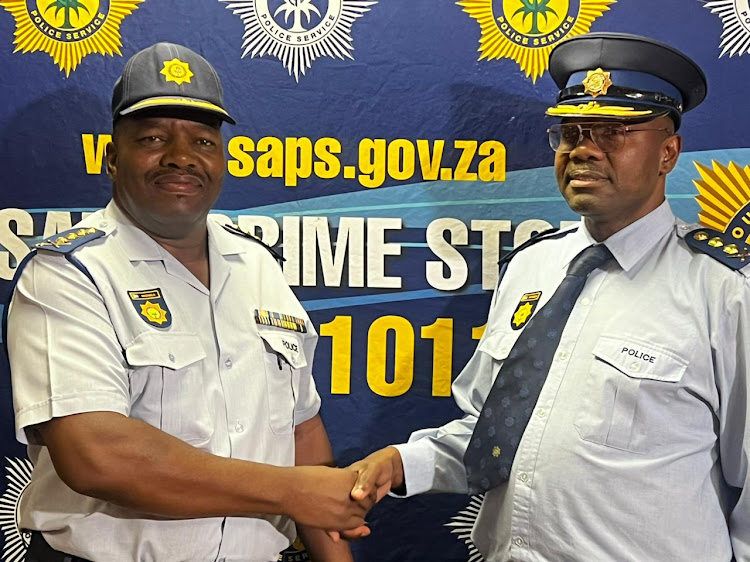 National police commissioner Gen Fannie Masemola (left) with newly appointed Gauteng police commissioner Lt-Gen Tommy Mthombeni.