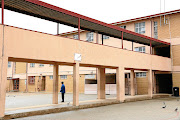 Ennerdale Secondary School's  walkway bridge is supported by scaffolding to prevent it from collapsing.