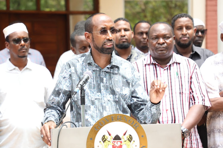 Mohamed Adan Khalif speaking to the press in Mandera town after vising various locations affected by the floods.