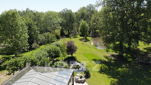 Prestige house for sale in Adainville (78113) - Landscaped garden with pond and large trees