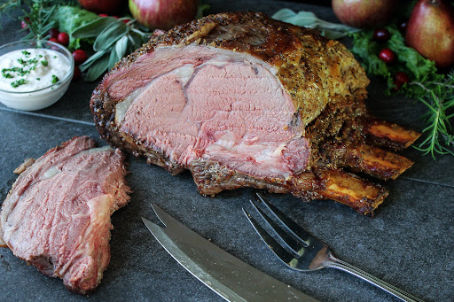 Smoked prime rib sliced.