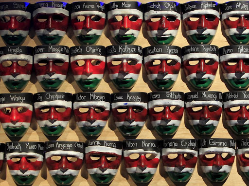 Face masks with names of the Garissa University College students, who were killed during an al Shabaab attack, are placed on a wooden board during a memorial concert at Freedom Corner in Nairobi on April 14.