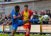 Mamelodi Sundowns' Grant Kekana makes a challenge in their friendly match against Dutch Eredivisie team Go Ahead Eagles.