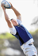 Jean Deysel takes a ball with his eyes shut during a Sharks training session at Kings Park in Durban this week