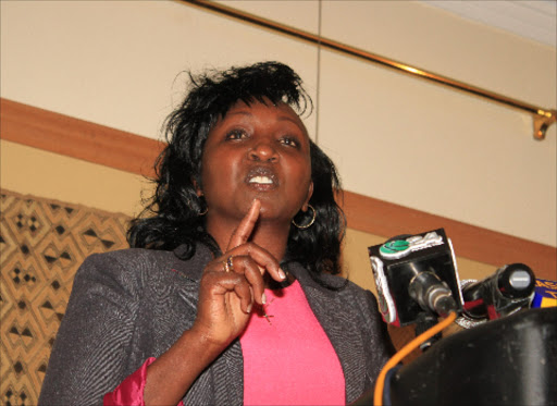 Former Chief registrar of the Judiciary Glady's Boss Shollei addressing a press conference at Intercon Hotel.Philip kamakya