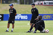 Cape Town City coaching stuff look on during a training session at the club's base at Hartleyvale Football Grounds in Cape Town on March 28 2019.  