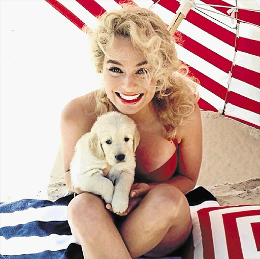 PUPPY LOVE: Margot Robbie posted this photo of herself on Instagram during her Vanity Fair photo shoot, in which the blonde bombshell emulates Hollywood icon Marilyn Monroe