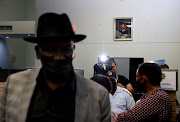 A portrait of outgoing national commissioner Gen Khehla Sitole hangs on a wall at Durban Central police station, which police minister Bheki Cele visited on Thursday.