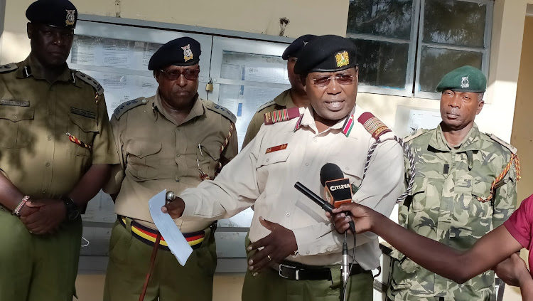 Garissa county commissioner Boaz Cherutich speaking to the press outside his office after the recovery on Thursday, March 3.