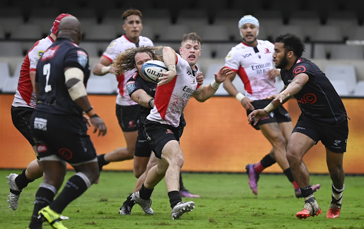 Morne van den Berg of the Lions tries to keep the ball their United Rugby Championship cash with Sharks at Kings Park in Durban on Saturday.