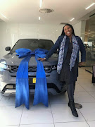 Cheryl Modise pictured with the brand new Range Rover Evoque that turned out to be a nightmare for her. Dealership CMH Jaguar Land Rover Menlyn cancelled the sale only when the motor industry ombud recommended it do so.