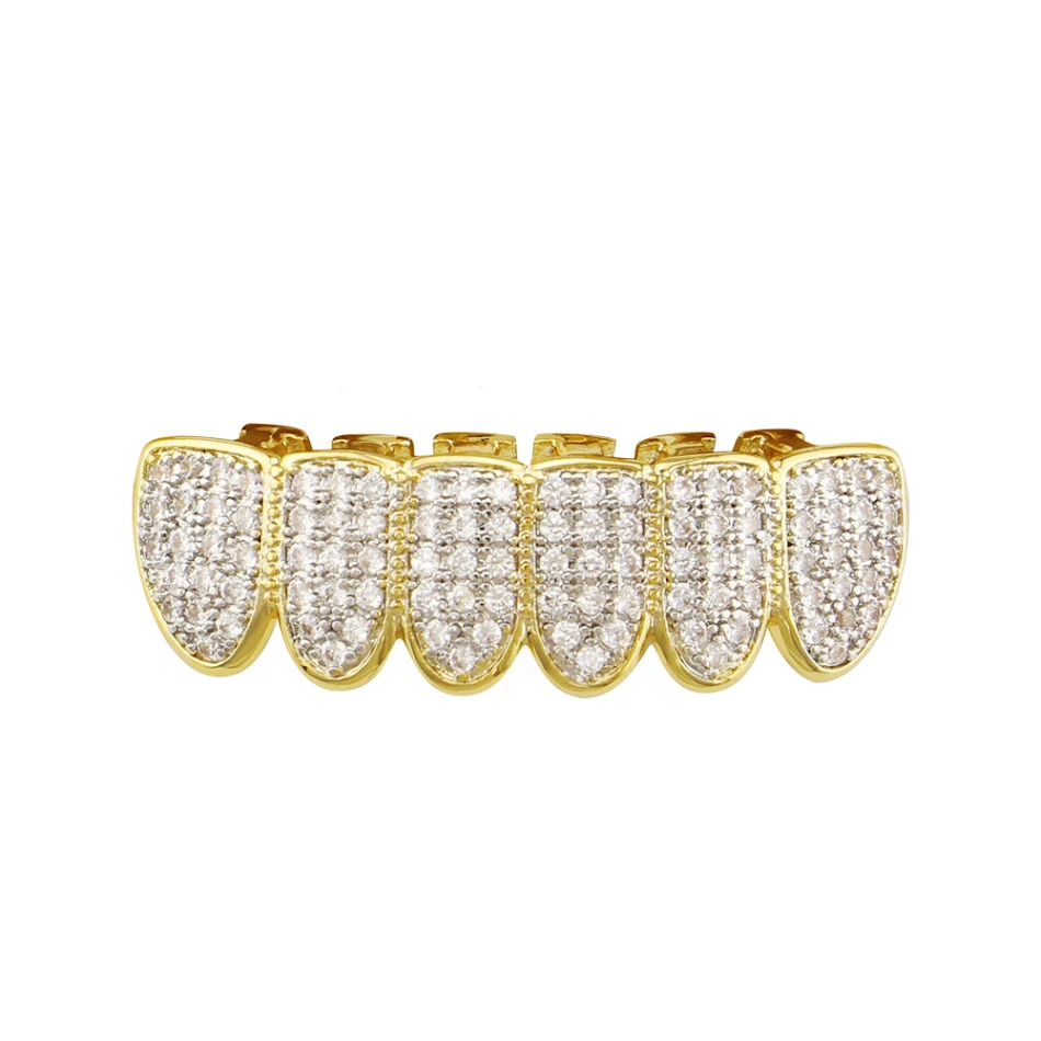 Appareil dentaire hip hop en or avec micro-sertissage de zircon, un style unique et une brillance éclatante pour sublimer votre sourire.