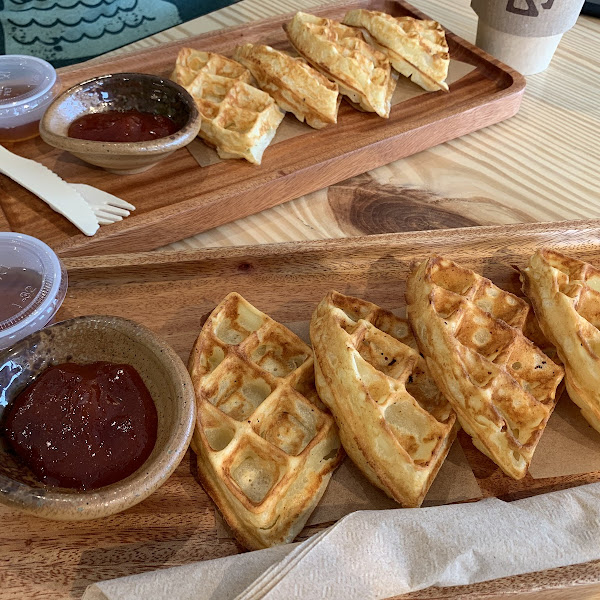 Cheesy waffles with guava jam and honey