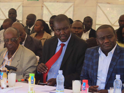 MILKING CASH COWS ? New KCC chairman Matu Wamae, Uasin Gishu Governor Jackson Mandago and New KCC chief executive Nixon Sigei during a meeting with farmers in Eldoret town on Friday.