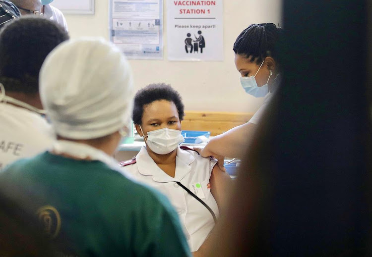 Sister Zoliswa Gidi-Dyosi is vaccinated against Covid-19 at Khayelitsha District Hospital on February 17 2021.