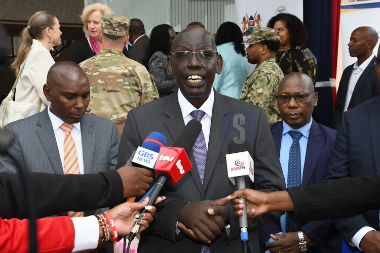 Basic Education Principal Secretary Belio Kipsang addresses the press during during the handing over of sanitary towels donated to the ministry of education by US government (USAID KENYA EAST AFRICA) on Wednesday 20, 2024