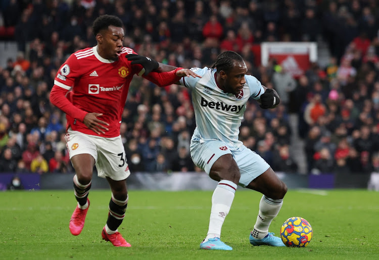 West Ham United's Michail Antonio in action with Manchester United's Anthony Elanga