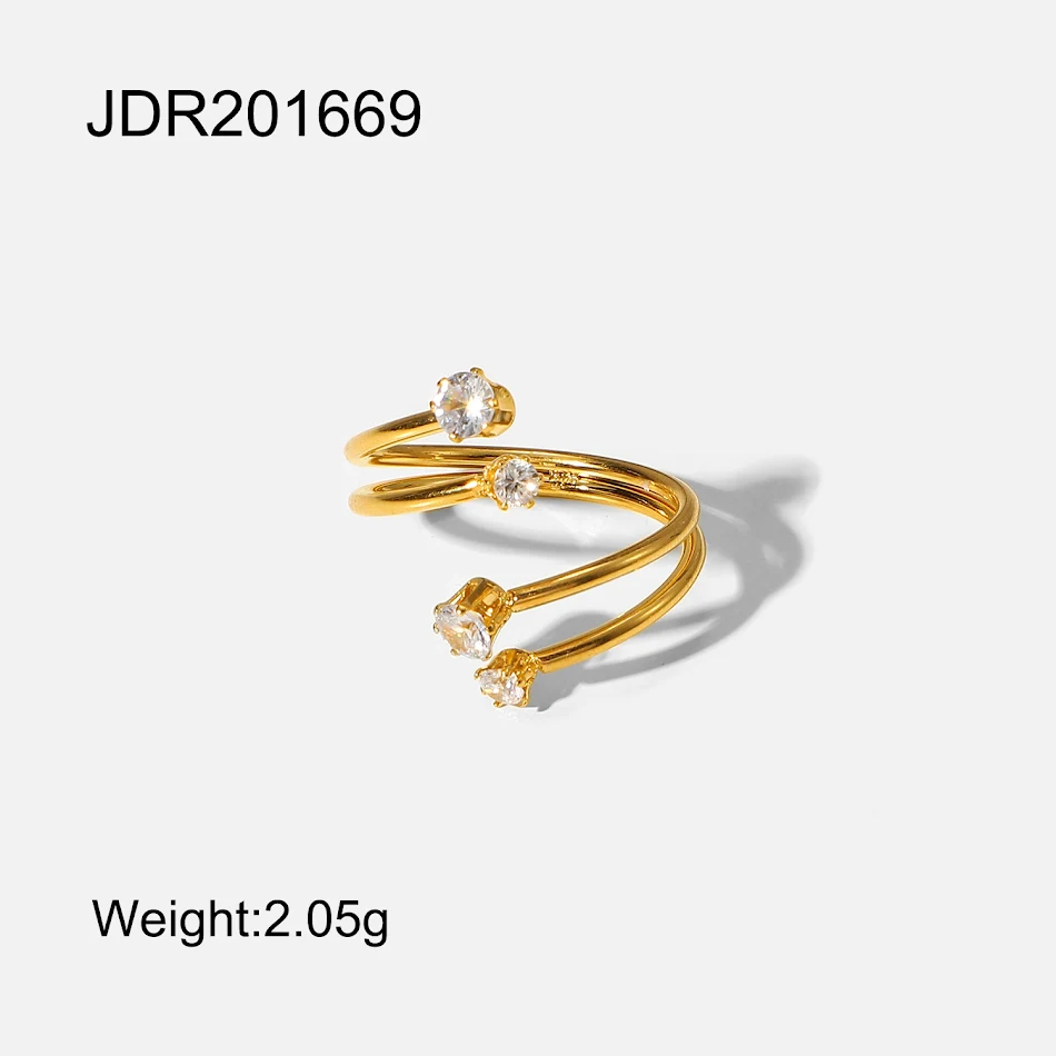 Otwarty pierścień z białym cyrkonem, 4 diamentami i złotem 18K. Idealny dodatek, który doda blasku i elegancji Twojej stylizacji.