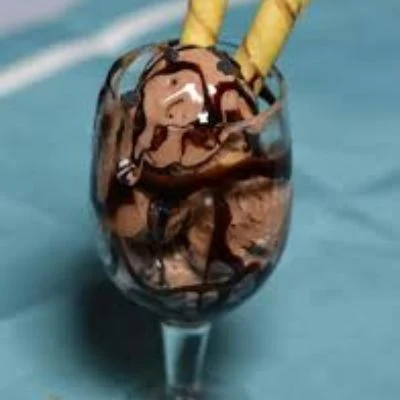 Ice Cream With Brownie In Chocolate Sauce