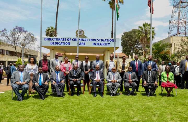 Outgoing DCI George Kinoti pose for a photo with colleagues after handing over power to acting Director Hamisi Massa on Friday, September 30,2022.