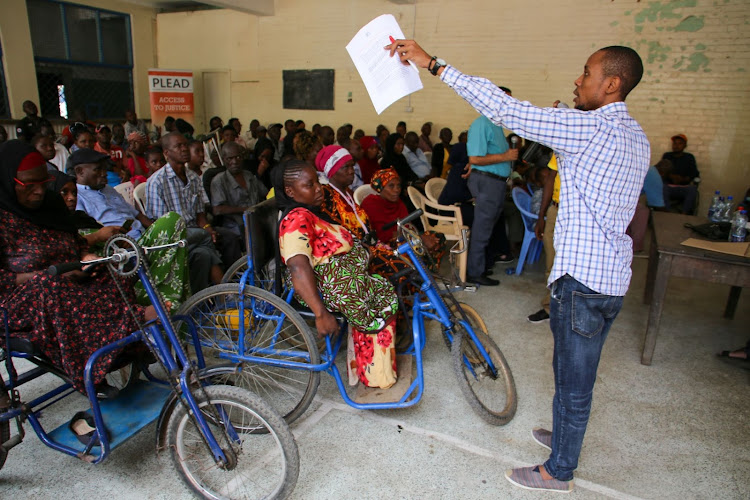 Huria's Anthony Maganga addressing PWDs at Tononoka Hall on Saturday