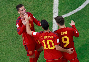 Spain's Ferran Torres celebrates scoring their fourth goal with Marco Asensio and Gavi 