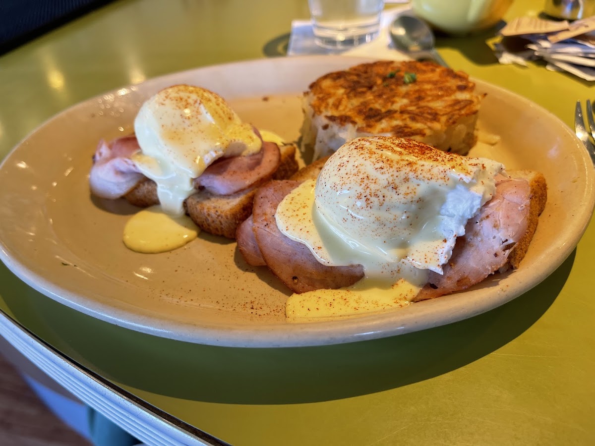 Eggs Benedict on Gluten Free toast with hashbrowns