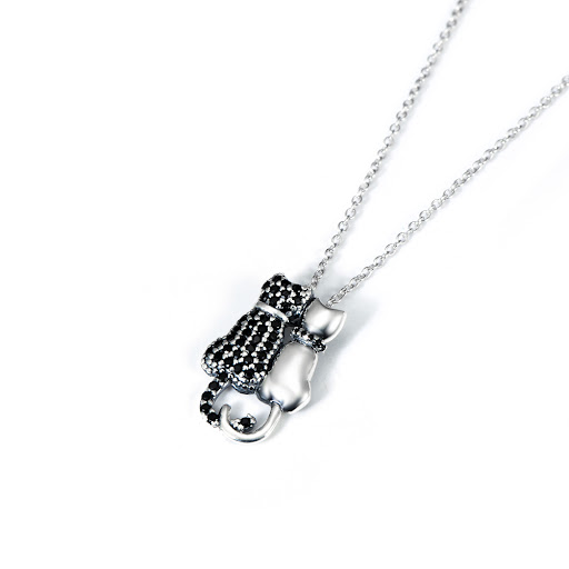 Title 1, Black and White Cat Necklace with Diamonds. A s...