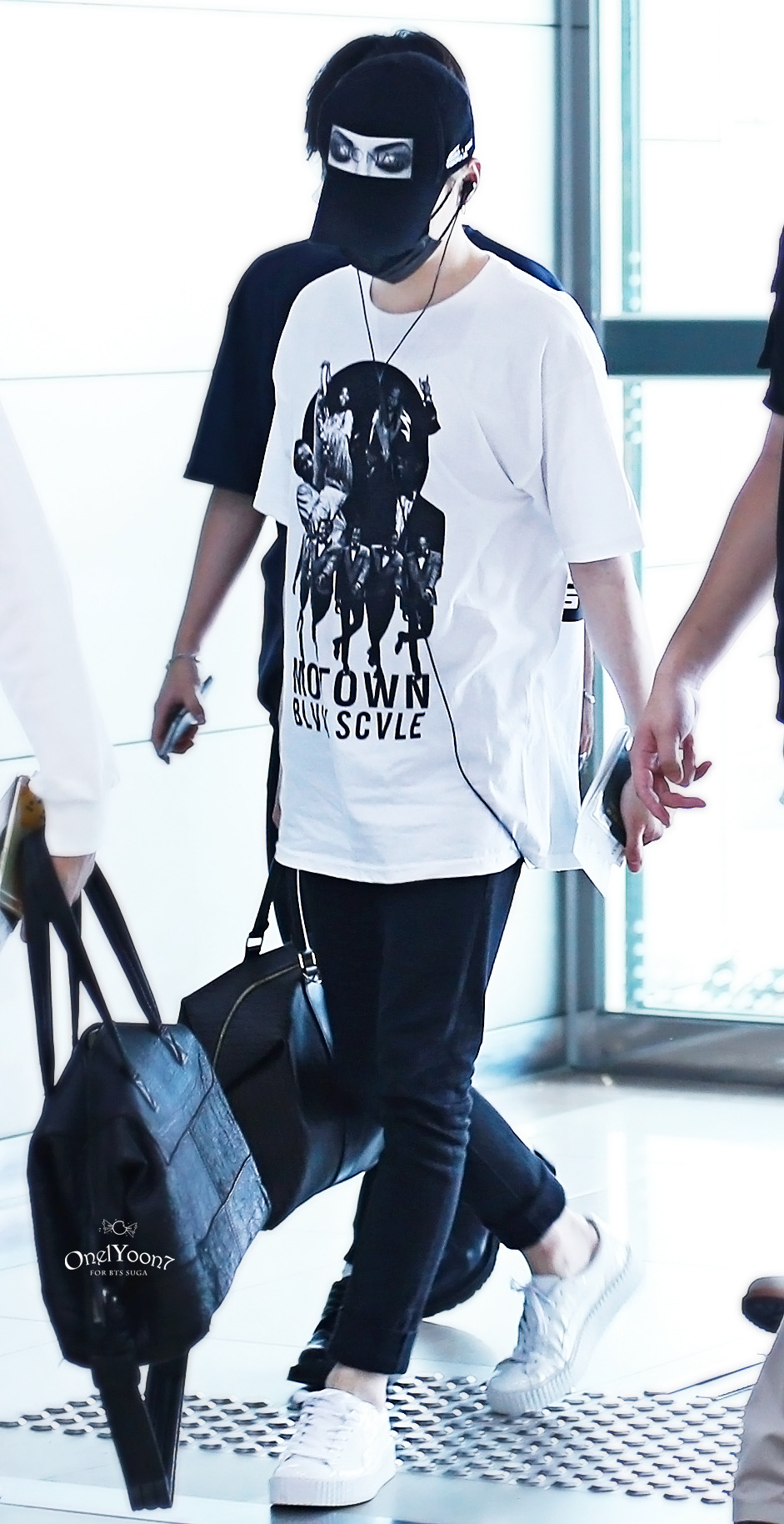 Photo of Suga BTS at the Airport Departing to Indonesia, Relaxed in Shorts  Like Wanting to