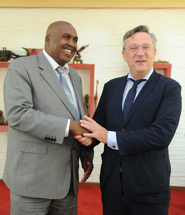 Mount Kenya University chairman and founder Simon Gicharu and Executive Coordinator of the United Nations Volunteers (UNV) programme Olivier Adam on Thika Main Campus on Friday.