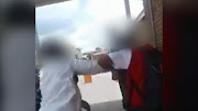 Schoolmates during a brawl at the Duvha Combined School. The school has gone up in flames following a suspected arson attack.