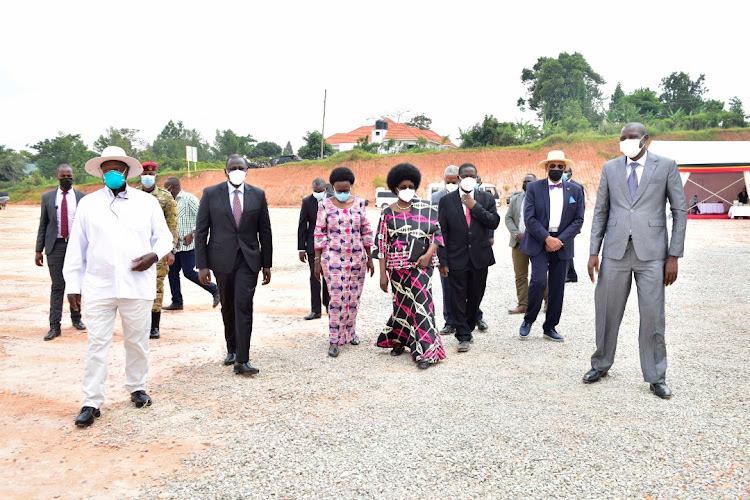 President Yoweri Kaguta Museveni of Uganda with Kenyan Deputy President William Ruto.