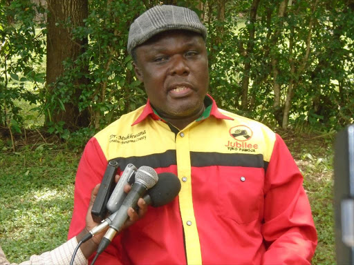 Bungoma Jubilee Senate aspirant Juma Mukhwana speaking in his Makutano home. /JOHN NALIANYA