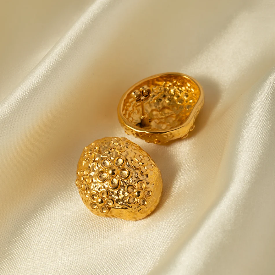 Gold Stainless Steel Hammer Patterned Flower Earrings. Add a touch of elegance to your look with these stylish and durab