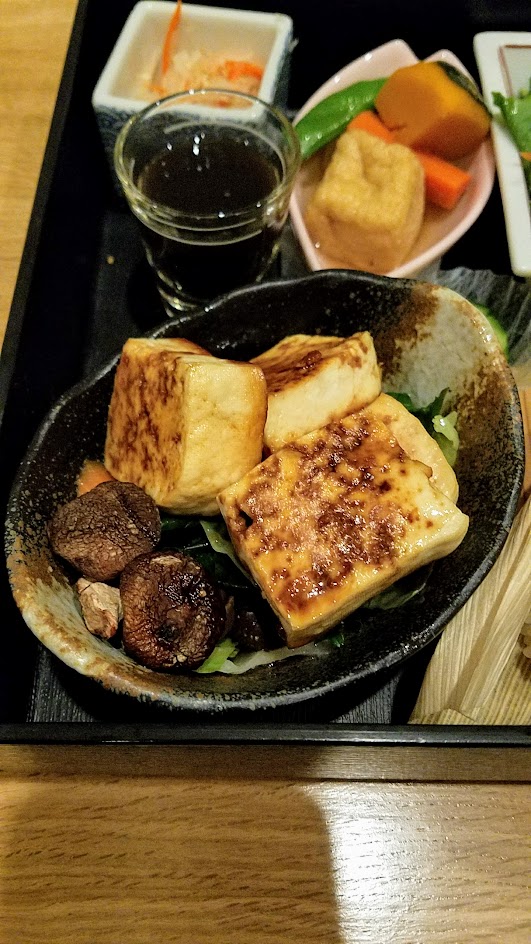 Chef Naoko's Shizuku - a restaurant with natural and organic Japanese cuisine, this is their vegan Shokado, an abbreviated kaiseki meal in a square lacquered box with Ota Tofu Steak