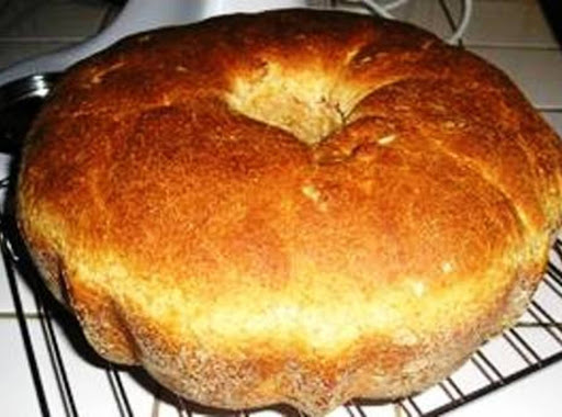 This picture is of a bread recipe I have that is very similar to this one. I baked this one in a bundt pan instead of a round casserole; great and easy bread!