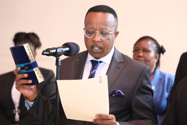 John Kilonzo Mwangangi taking oath of office at Machakos County offices in Mavoko subcounty, Athi River on July 31.