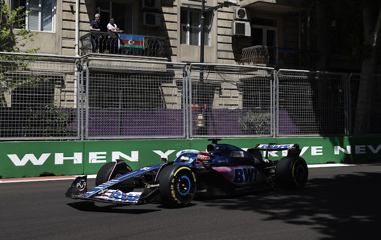 The Azerbaijan Grand Prix ended controversially when Alpine's Esteban Ocon pitted on the last lap and nearly hit photographers standing in the pitlane. Picture: REUTERS