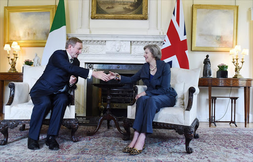 Britain's Prime Minister Theresa May (R) poses for photographers with Ireland's Taoiseach Enda Kenny inside 10 Downing Street, London, Britain July 26, 2016.