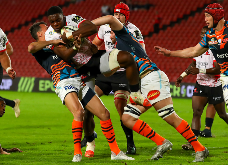 Emmanuel Tshituka of the Lions tackled during their Challenge Cup match against Racing 92 at Ellis Park last weekend. Tshituka was later sent off and has subsequently been banned for three weeks.