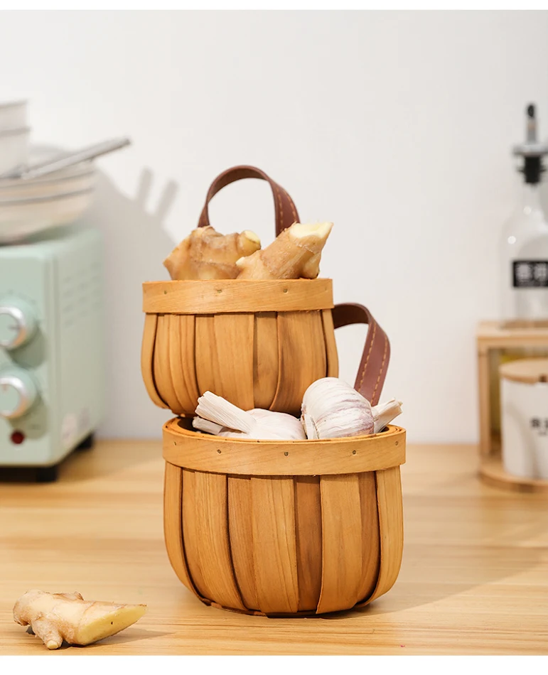 Handwoven wall mounted bamboo basket for stylish organization and natural home decor. Space saving design, perfect for s