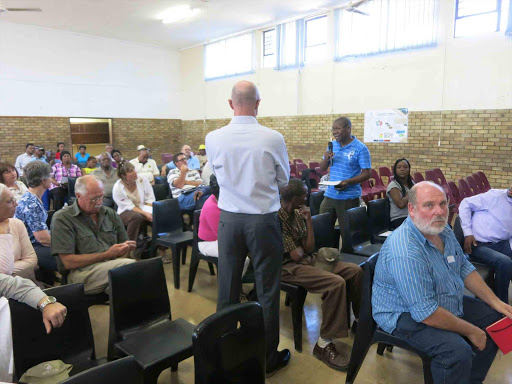 FRACTURED … Miner and local ANC politician Vuyisile Booysen speaks out against the failure of township residents of Graaff-Reinet to pitch at the Masizake community hall to listen to the first public presentation from a government-appointed team of scientists on Monday afternoon. They blamed the scientists for their urban-styled advertising campaign. Picture: MIKE LOEWE