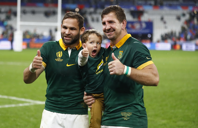 The Springboks' Cobus Reinach and Kwagga Smith of South Africa after their 2023 Rugby World Cup semifinal win against England at Stade de France in Paris on Saturday.