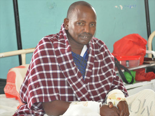 Teacher John Matipei recuperates at Kajiado County Referral Hospital on February 18 after he was attacked by a hyena on Valentine's Day.